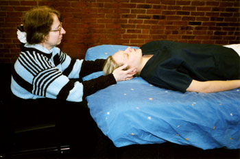 Linda Boucher practicing Reiki